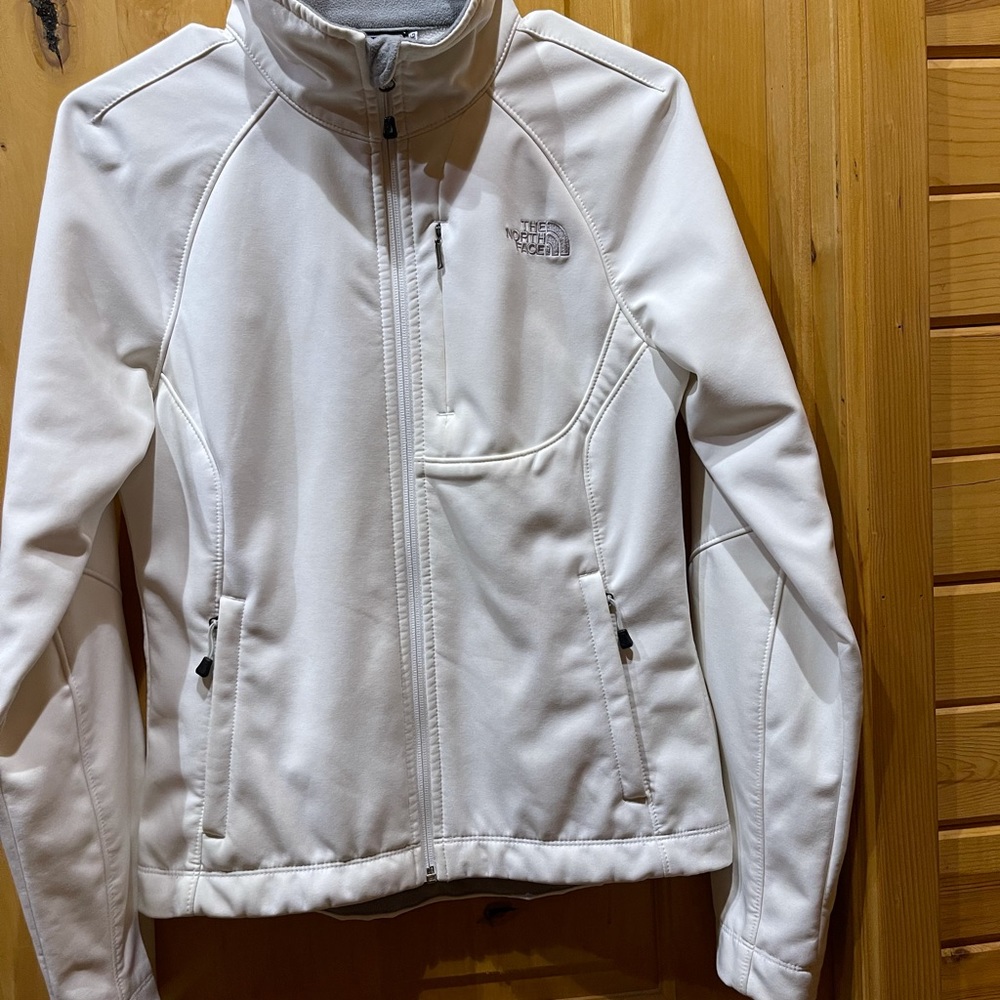 The North Face XS white like new jacket.
